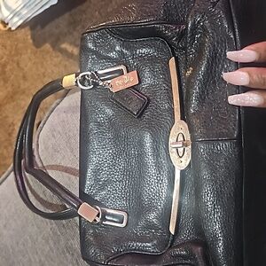 This is a beautiful  medium size coach bag. Great shape.